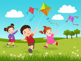 Fototapeta na wymiar Three kids flying kites in the park
