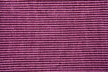 Background texture of purple striped velvet closeup