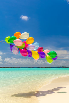 Colorful balloons flying in the wind