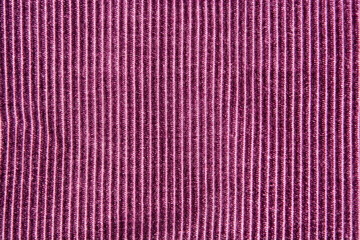 Background texture of purple striped velvet closeup