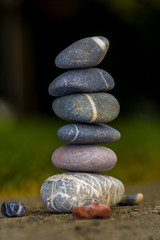Tower from colorful stones on blured backround
