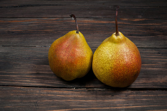Delicious Williams pears on a rustic wooden table