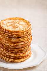 Carnival. Pancakes. Image in a rustic style.