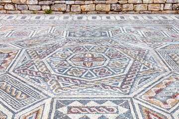 Complex and elaborate Roman tessera mosaic pavement in the House of the Skelletons. Conimbriga in Portugal, is one of the best preserved Roman cities on the west of the empire.