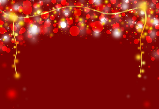 Red glitter sparkle defocused rays lights bokeh abstract chistmas background.