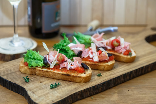 Tapas with Crusty Bread - Selection of Spanish tapas served on baguette.