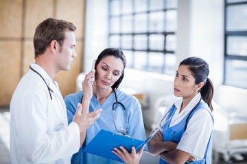 Medical team discussing the report together 