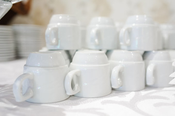 Stack of clean cups ready to be used on dinner