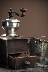Antique coffee grinder with space for your text. 