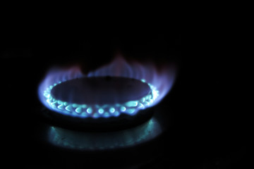 Burning gas burner in the darkness