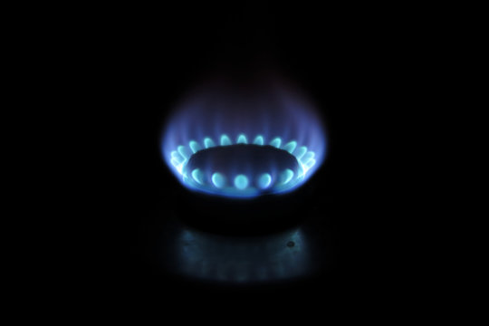 Burning gas burner in the darkness