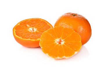whole and half cut murcott mandarin orange on white background
