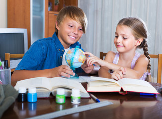 Fototapeta premium Portrait of children with textbooks