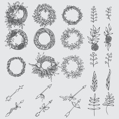Fototapeta premium Hand drawn Vintage decorative lovely set of laurels, branches and wreaths. Doodle greek ancient wreath, text dividers and borders with laurel leaves