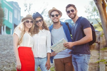 Hip friends checking at map