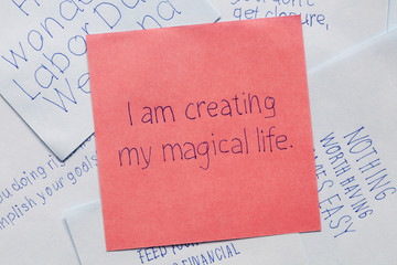 Sticky note with text I am creating my magical life