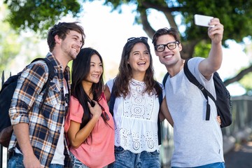 Hip friends taking selfie