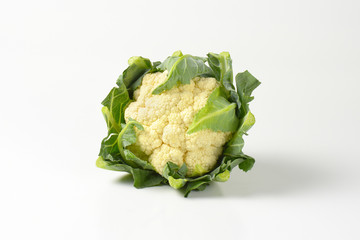 fresh cauliflower with leaves
