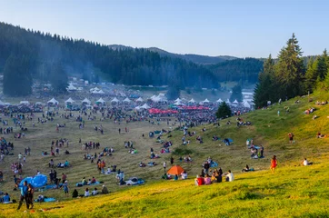 Tuinposter Swarms of people are gathering during Rozhen folklore festival in Bulgaria in rhodope mountains. © dudlajzov