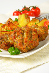 vegetable and cheese patties with potato wedges