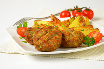 vegetable and cheese patties with potato wedges