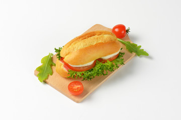 bun sandwich with cheese and vegetables