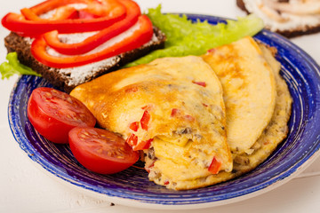 Omelet in a blue plate