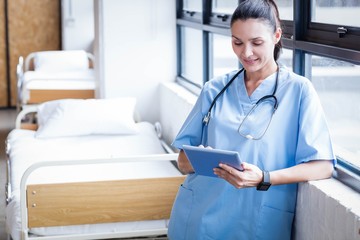 Nurse using her tablet pc