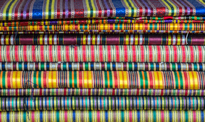 heap of oriental textiles in draper's shop at arabian market in Jerusalem, Israel