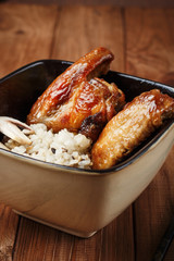 Rice with mushrooms and baked chicken wings