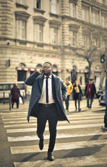 Businessman walking in the street