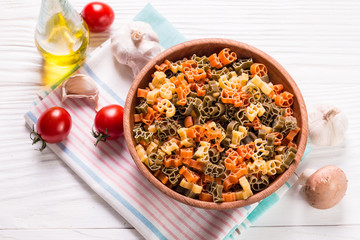 still life with raw homemade pasta and ingredients for pasta.