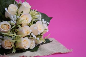Close-up artificial white roses.
