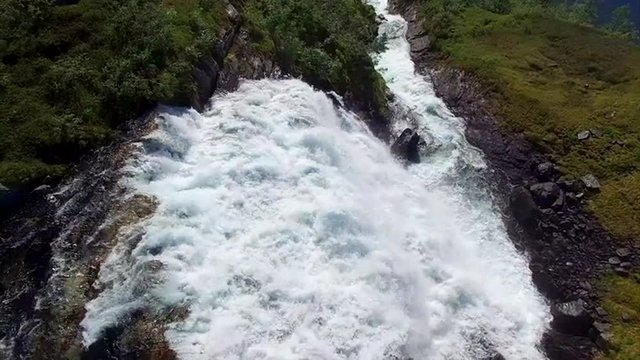 Top-down view of waterfall in mountain pass Gaularfjellet in Norway. Aerial 4k Ultra HD.