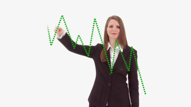 Green sales statistic with presenter defocused
