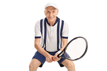 Cheerful senior playing tennis
