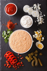 Thousand Island Dressing with ingredients. vertical top view

