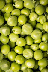 green peas on wooden table ,healthy concept