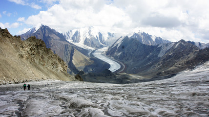 Trekkers at glacier Greater Caucasus Mountain Range