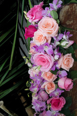 Beautiful Roses flower and orchid bouquet in vintage background