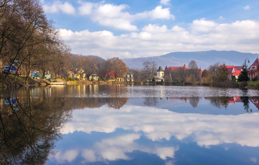 Fototapeta premium Rest on the shore of a mountain lake, high in the mountains