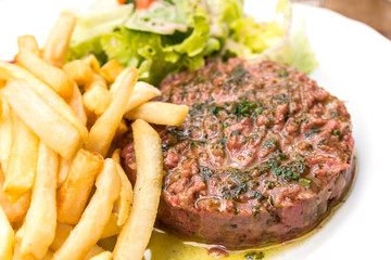 tasty Steak tartare (Raw beef) - classic steak tartare on white