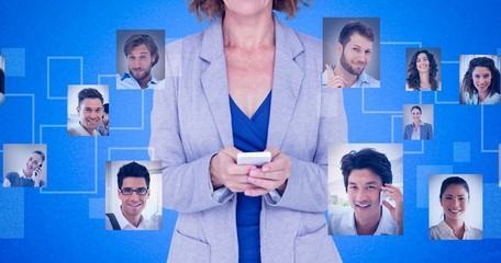 Composite image of portrait businesswoman using mobile