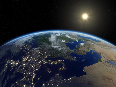 Earth from satellite. Beautiful sunrise over Europe. Earth at night and in daytime. 3D realistic illustration.
