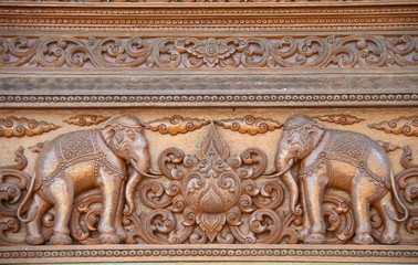 Elephant carved on the wood in Thai temple, Chiang Mai, Thailand