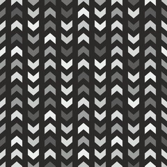 Tile vector pattern with grey and black arrows on black background