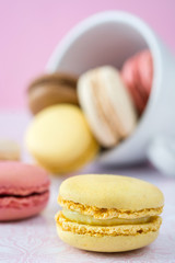 colorful macarons out of a cup