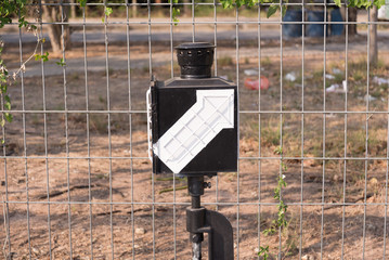 railroad switch in the urban station of Thailand. right arrow