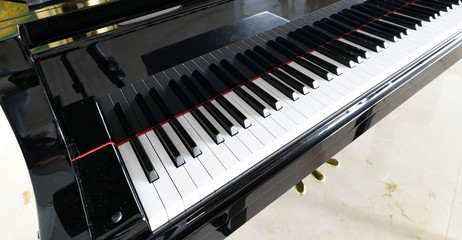 Brand new baby grand piano and keyboard