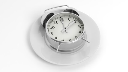 Silver alarm clock with fork and knife pointers on plate, isolated on white background.